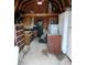 Interior of a barn with storage, appliances, and furniture at 1447 Upper Sweetwater Se Trl, White, GA 30184