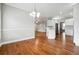 Spacious dining area adjacent to the kitchen with hardwood floors at 2984 Berry Rd, Loganville, GA 30052