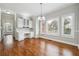 Eat-in kitchen area with ample natural light and hardwood floors at 2984 Berry Rd, Loganville, GA 30052