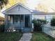 Charming two-story home with a covered front porch and fenced yard at 309 Fletcher Sw St, Atlanta, GA 30315