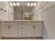 Clean and crisp bathroom with a double vanity and plenty of storage space at 2689 Richmond Row, Suwanee, GA 30024