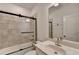Modern bathroom with tiled shower and single vanity at 2689 Richmond Row, Suwanee, GA 30024