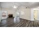 Gathering room with hardwood floors and kitchen view at 3041 Lexington Ave, Woodstock, GA 30189