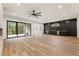 Spacious basement with wet bar, fireplace, and sliding glass doors at 6214 Talmadge Nw Way, Acworth, GA 30101