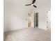 Bright, empty bedroom with carpet, white walls, and an open door to another room at 6214 Talmadge Nw Way, Acworth, GA 30101