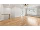 Bright bonus room or loft with built-in bookshelves and hardwood floors at 6214 Talmadge Nw Way, Acworth, GA 30101