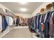 Large organized walk-in closet with ample storage at 300 Meadowwood Cir, Woodstock, GA 30188