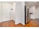 Entry foyer with hardwood floors and access to the kitchen at 3334 Peachtree Ne Rd # 908, Atlanta, GA 30326