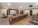 Community home theater room with brown leather reclining chairs, projector, and large screen at 3334 Peachtree Ne Rd # 908, Atlanta, GA 30326