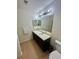 Another view of the bathroom featuring the vanity, mirror, and toilet at , Roswell, GA 30076