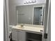 View of the bathroom vanity, mirror, and toilet at 113 Ellis Dr, Conyers, GA 30012