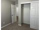 Bedroom with closet and neutral decor at 113 Ellis Dr, Conyers, GA 30012