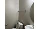 Simple half-bath with a pedestal sink and oval mirror at 113 Ellis Dr, Conyers, GA 30012