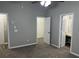 Main bedroom with ensuite bathroom, walk-in closet, and plush carpet at 113 Ellis Dr, Conyers, GA 30012