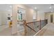 Upstairs hallway with a view of the loft/bonus room at 27 Homesite Compass Rd, Hampton, GA 30228