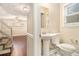 Clean bathroom with pedestal sink and toilet at 3435 Misty Valley Rd, Decatur, GA 30032