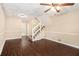 Living room with hardwood floors and stairs at 3435 Misty Valley Rd, Decatur, GA 30032