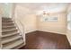 Spacious living room featuring hardwood floors and a staircase at 3435 Misty Valley Rd, Decatur, GA 30032