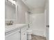 Clean and bright bathroom with white vanity, shower/tub combo, and updated fixtures at 125 Cedars Glen Cir, Villa Rica, GA 30180