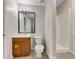 Simple bathroom with a shower, toilet, and vanity at 125 Cedars Glen Cir, Villa Rica, GA 30180