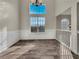 Dining room with updated wainscoting and large, bright windows at 125 Cedars Glen Cir, Villa Rica, GA 30180