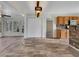 Eat-in kitchen with tile floors, oak cabinets, and access to a sunroom at 125 Cedars Glen Cir, Villa Rica, GA 30180