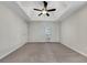 Large main bedroom with plush carpet and a ceiling fan at 125 Cedars Glen Cir, Villa Rica, GA 30180
