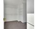 Large walk-in closet with built-in shelving and ample storage space at 125 Cedars Glen Cir, Villa Rica, GA 30180
