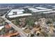 Aerial view showing home's location near businesses and residential area at 4251 Hamilton Mill Rd, Buford, GA 30519