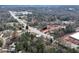 Aerial view showing home's location near commercial areas and highway at 4251 Hamilton Mill Rd, Buford, GA 30519