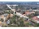 Aerial view showing home's location near commercial areas and highway at 4251 Hamilton Mill Rd, Buford, GA 30519