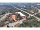 Aerial view showing home's location near commercial areas and highway at 4251 Hamilton Mill Rd, Buford, GA 30519