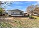House exterior and backyard with patio and basketball court at 4251 Hamilton Mill Rd, Buford, GA 30519