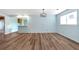 Bright dining area with light blue walls and wood-look floors at 4251 Hamilton Mill Rd, Buford, GA 30519