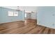 Open concept dining area with wood-look flooring and light walls at 4251 Hamilton Mill Rd, Buford, GA 30519