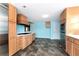 Kitchen with light wood cabinets, stainless steel appliances, and tile floors at 4251 Hamilton Mill Rd, Buford, GA 30519