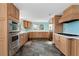 Updated kitchen with stainless steel appliances and light wood cabinets at 4251 Hamilton Mill Rd, Buford, GA 30519