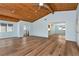Spacious living room featuring vaulted wood ceilings and wood-look flooring at 4251 Hamilton Mill Rd, Buford, GA 30519