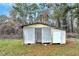 Metal storage shed with additional smaller shed at 4251 Hamilton Mill Rd, Buford, GA 30519