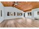 Bright sunroom with vaulted wood ceilings and wood-look flooring at 4251 Hamilton Mill Rd, Buford, GA 30519