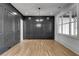 Elegant dining room boasts dark gray walls and hardwood floors at 1254 Prospect Rd, Lawrenceville, GA 30043
