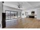 Spacious living room features hardwood floors and a wall of windows at 1254 Prospect Rd, Lawrenceville, GA 30043