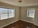 Bedroom with hardwood floors, neutral walls, and ample natural light at 149 Bixby Se Ter, Atlanta, GA 30317