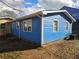 Side view of a blue house with white trim and multiple windows at 149 Bixby Se Ter, Atlanta, GA 30317