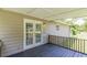 Back deck with wooden railings, exterior siding, and views of the backyard at 6226 Pine Ln, Douglasville, GA 30135