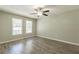 Bright bedroom with ample space and wood-look flooring at 6226 Pine Ln, Douglasville, GA 30135