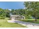 Inviting one-story residence with an attached garage and spacious driveway at 6226 Pine Ln, Douglasville, GA 30135