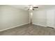 Large main bedroom with wood-look flooring and ceiling fan at 6226 Pine Ln, Douglasville, GA 30135