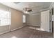 Bedroom with exposed brick wall and ceiling fan at 8661 Chestnut Ln, Lithia Springs, GA 30122