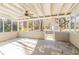 Spacious screened porch overlooking backyard and storage shed at 8661 Chestnut Ln, Lithia Springs, GA 30122